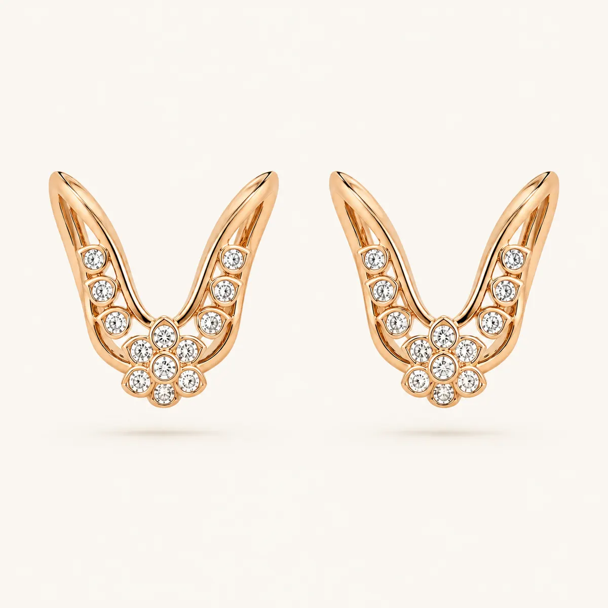 Rose gold horseshoe diamond ring with pavé flower