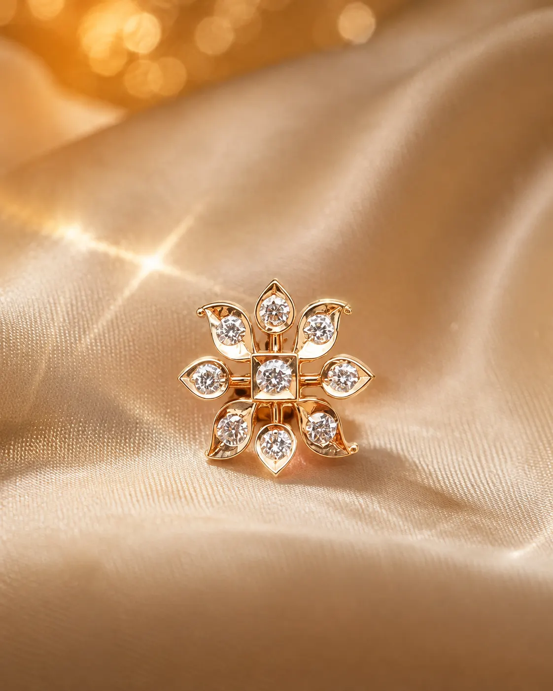 Sunburst diamond stud earring on silk velvet cushion